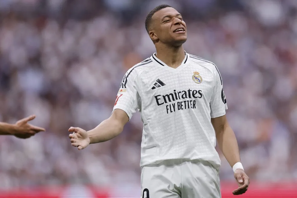 Real Madrid's French forward #09 Kylian Mbappé reacts during the Spanish league football match between Real Madrid CF and Real Sociedad at Santiago Bernabeu Stadium in Madrid on May 24, 2025. (Photo by OSCAR DEL POZO / AFP)
