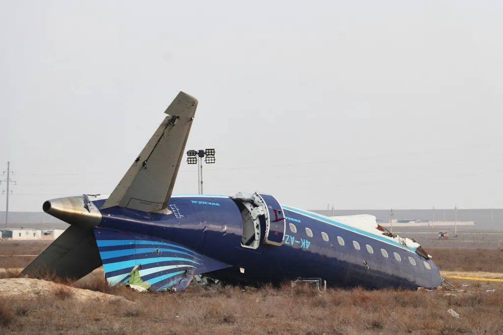 AKTAU, KAZAKHSTAN - DECEMBER 27: Evidence collection efforts are underway at the crash site of an Azerbaijan Airlines (AZAL) passenger plane near Aktau, Kazakhstan, on December 27, 2024. According to the ministry, 62 passengers and five crew members were on board Flight 8432, which caught fire following the crash, adding that emergency responders are working to extinguish it. Meiramgul Kussainova / Anadolu (Photo by Meiramgul Kussainova / Anadolu via AFP)