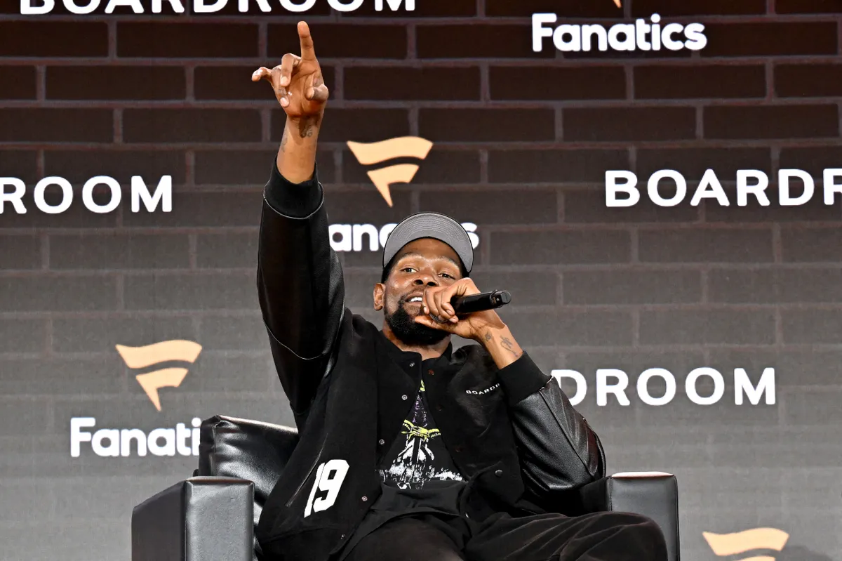 NEW YORK, NEW YORK - JUNE 22: Kevin Durant speaks onstage during Fanatics Fest NYC 2025 at Javits Center on June 22, 2025 in New York City.   Slaven Vlasic/Getty Images/AFP (Photo by Slaven Vlasic / GETTY IMAGES NORTH AMERICA / Getty Images via AFP)
