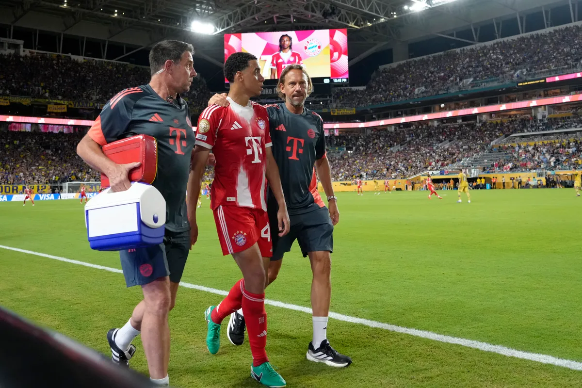 Bayern München, Jamal Musiala attacking midfield of Bayern Munich and Germany is replaced injured during the FIFA Club World Cup 2025 group C match between FC Bayern München and CA Boca Juniors at Hard Rock Stadium on June 20, 2025 in Miami Gardens, Florida. (Photo by Jose Breton/Pics Action/NurPhoto) (Photo by Jose Breton / NurPhoto via AFP)