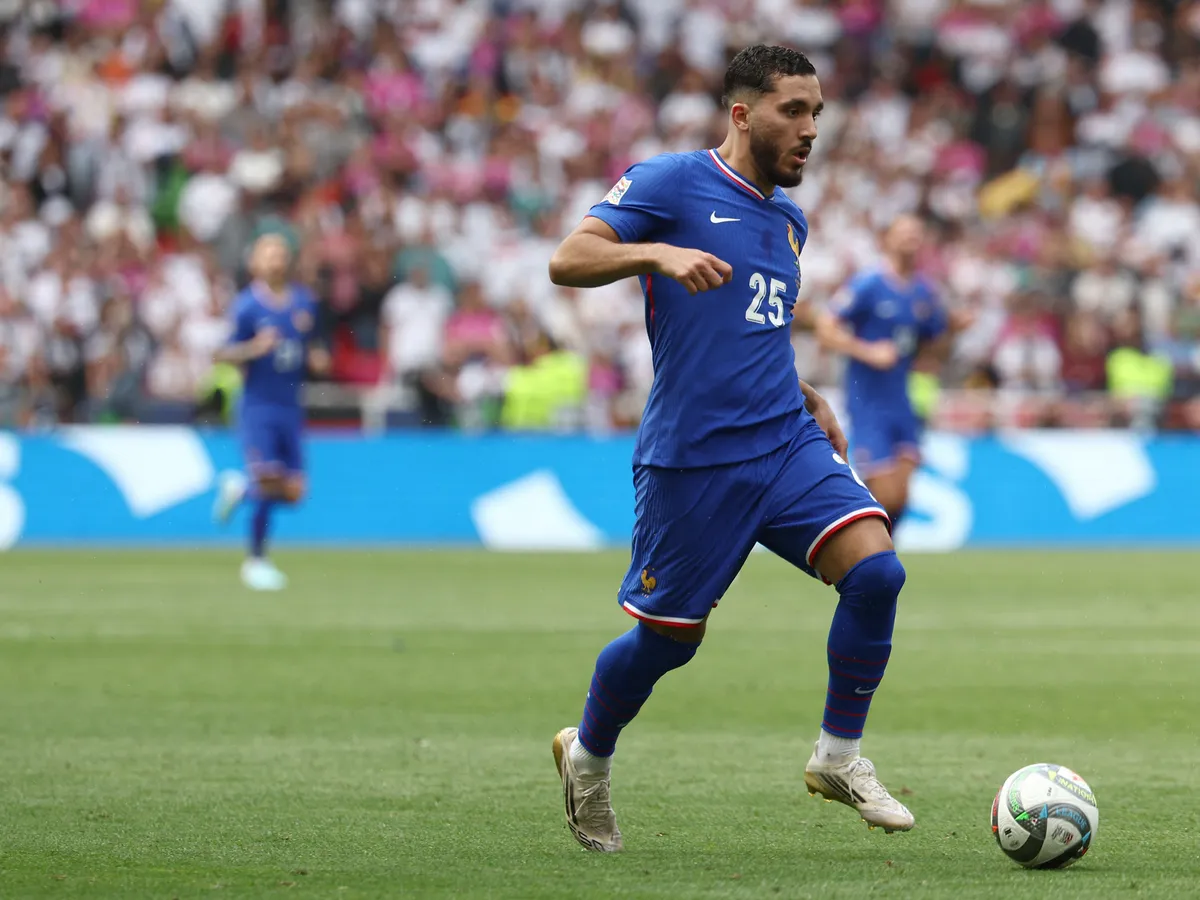 Szoboszlai, France's forward #25 Rayan Cherki plays the ball during the UEFA Nations League third place play-off football match between Germany and France in Stuttgart, southwestern Germany on June 8, 2025. (Photo by FRANCK FIFE / AFP)