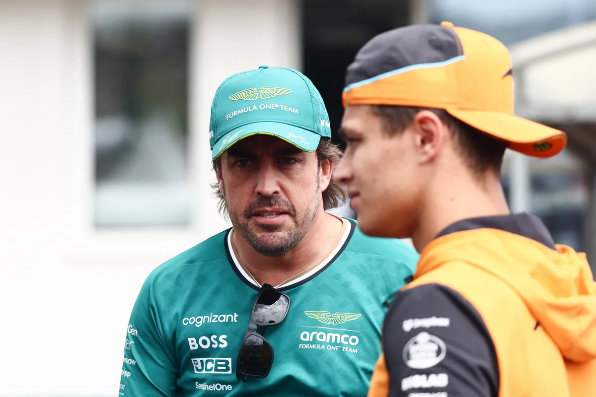 Fernando Alonso of Aston Martin Aramco and Lando Norris of McLaren at drivers parade ahead of the Formula 1 Hungarian Grand Prix at Hungaroring in Budapest, Hungary on July 21, 2024. (Photo by Jakub Porzycki/NurPhoto) (Photo by Jakub Porzycki / NurPhoto via AFP)
