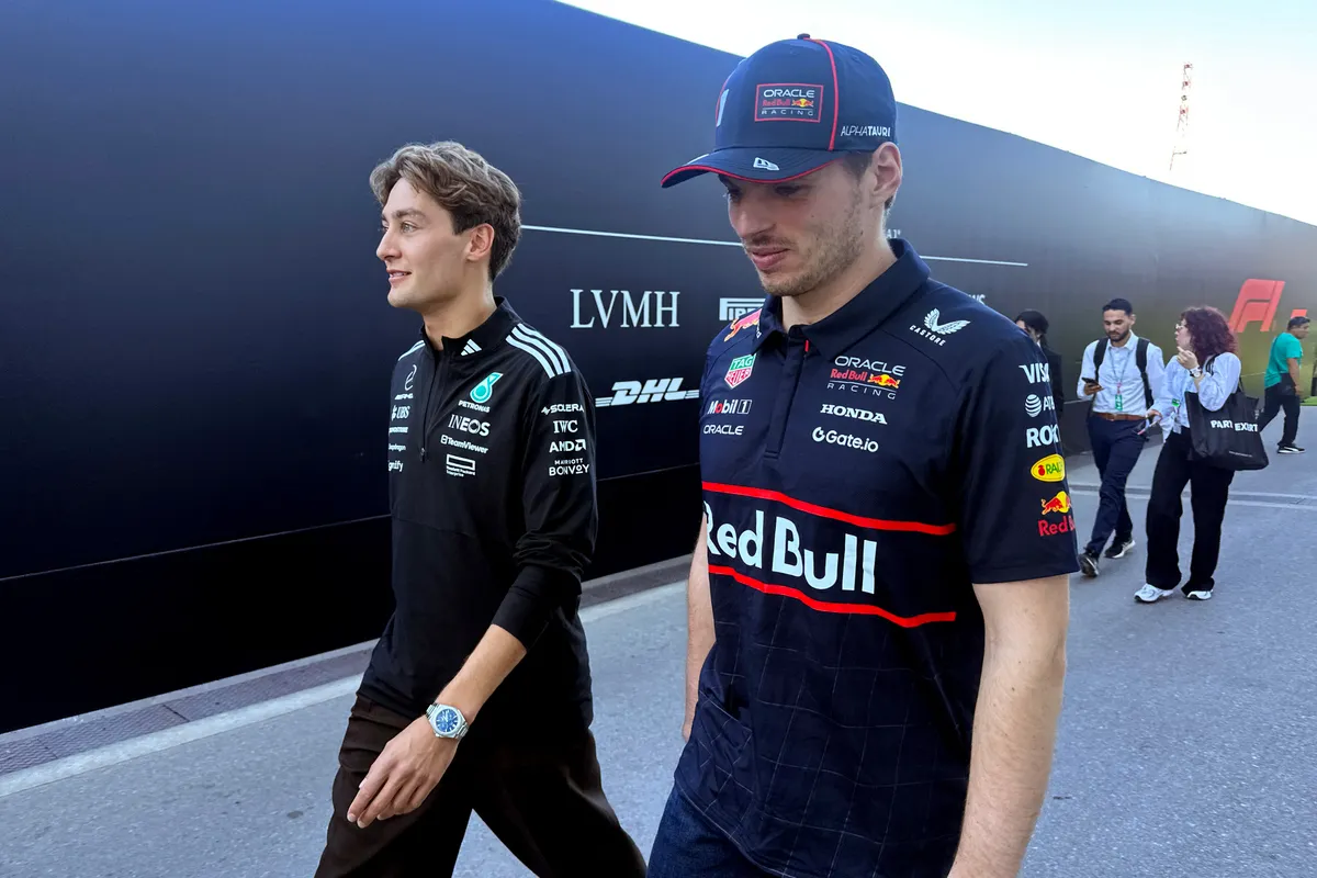 MONTREAL, QUEBEC - JUNE 15: (Editors Note : Image shot on mobile device) Race winner George Russell of Great Britain and Mercedes AMG Petronas F1 Team and Second placed Max Verstappen of the Netherlands and Oracle Red Bull Racing walk back from the Stewards Office during the F1 Grand Prix of Canada at Circuit Gilles-Villeneuve on June 15, 2025 in Montreal, Quebec.   Clive Rose/Getty Images/AFP (Photo by CLIVE ROSE / GETTY IMAGES NORTH AMERICA / Getty Images via AFP)