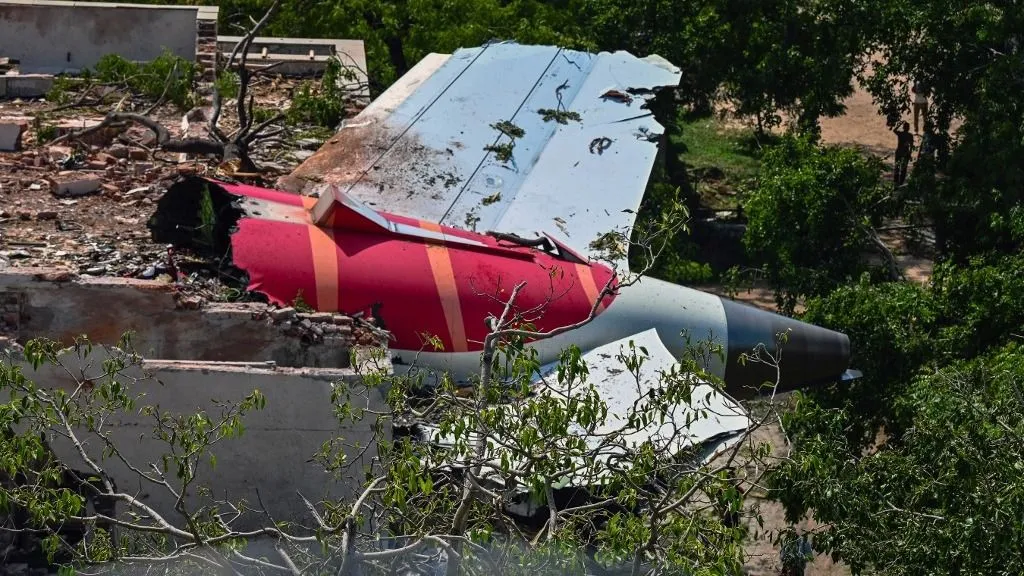 Air India, Rescue efforts take place at the site of the Air India flight crash. 241 people die and many others are injured after Air India Flight 171, bound for London from Ahmedabad, crashes moments after take-off. The plane crashes into a resident doctors' hostel in Ahmedabad, causing significant casualties and damage to the buildings. The crash occurs in Ahmedabad, India, on June 12, 2025, Thursday afternoon. (Photo by Saurabh Sirohiya/NurPhoto) (Photo by Saurabh Sirohiya / NurPhoto via AFP)