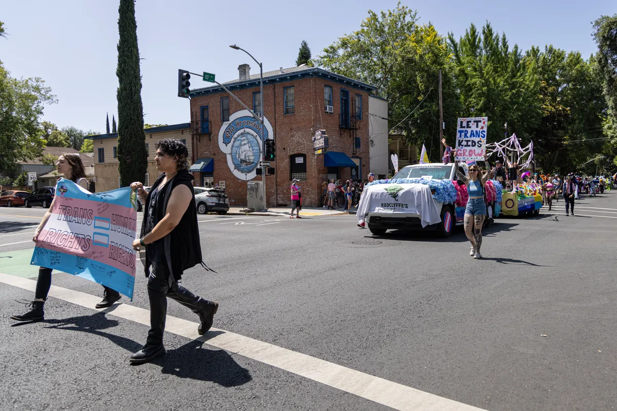 The LGBTQ+ community, along with allies, community members, and associated businesses and organizations, march from Southside Park to the state capital in Sacramento, Calif., on June 25, 2025. (Photo by Penny Collins/NurPhoto) (Photo by Penny Collins / NurPhoto via AFP)