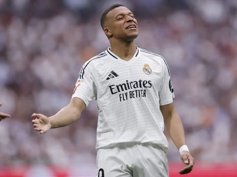 Real Madrid's French forward #09 Kylian Mbappe reacts during the Spanish league football match between Real Madrid CF and Real Sociedad at Santiago Bernabeu Stadium in Madrid on May 24, 2025. (Photo by OSCAR DEL POZO / AFP)