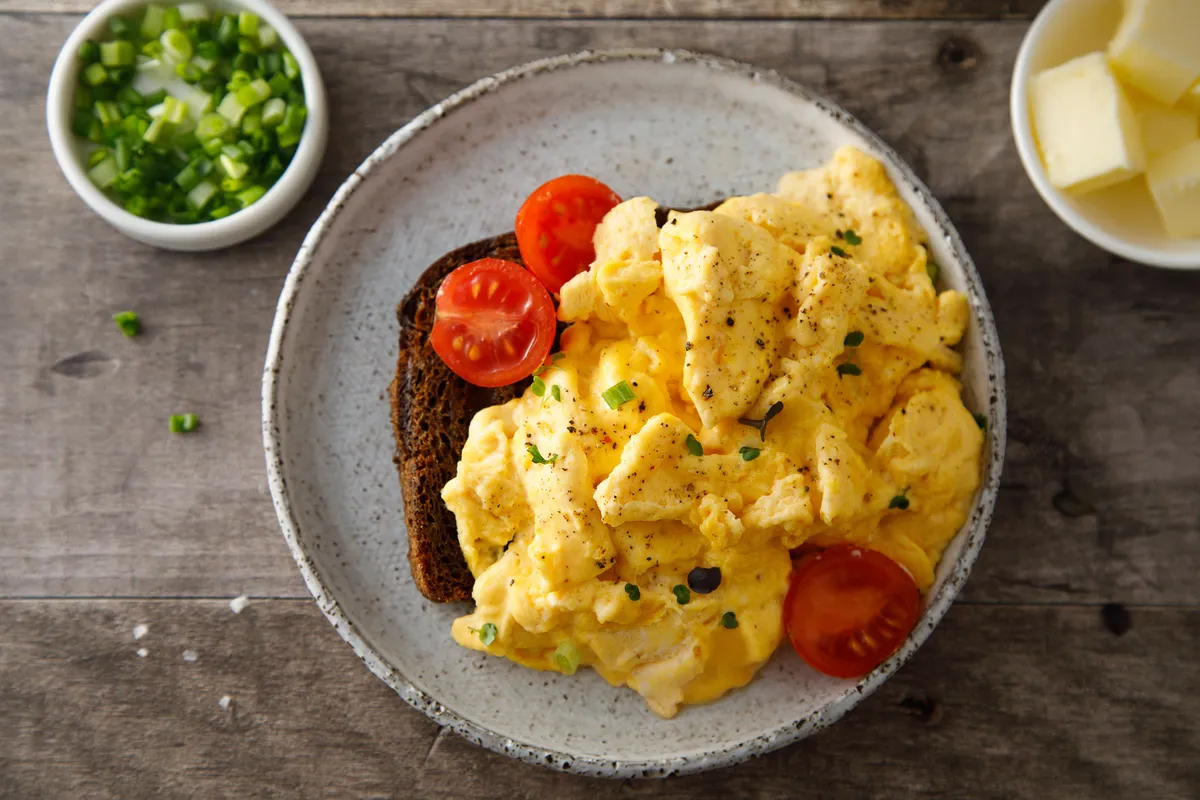Traditional scrambled eggs with fresh tomatoes
