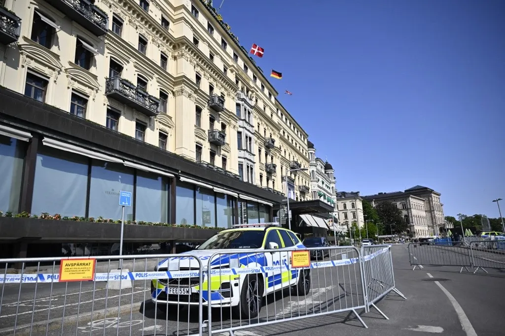 Police and riot fence outside the Grand Hotel during the Bilderberg meeting in Stockholm, Sweden, Thursday June 12, 2025. The Bilderberg Group has booked the Grand Hotel in central Stockholm from June 10 to June 14.
Photo: Christine Olsson / TT / Code 10430 (Photo by CHRISTINE OLSSON / TT News Agency via AFP)