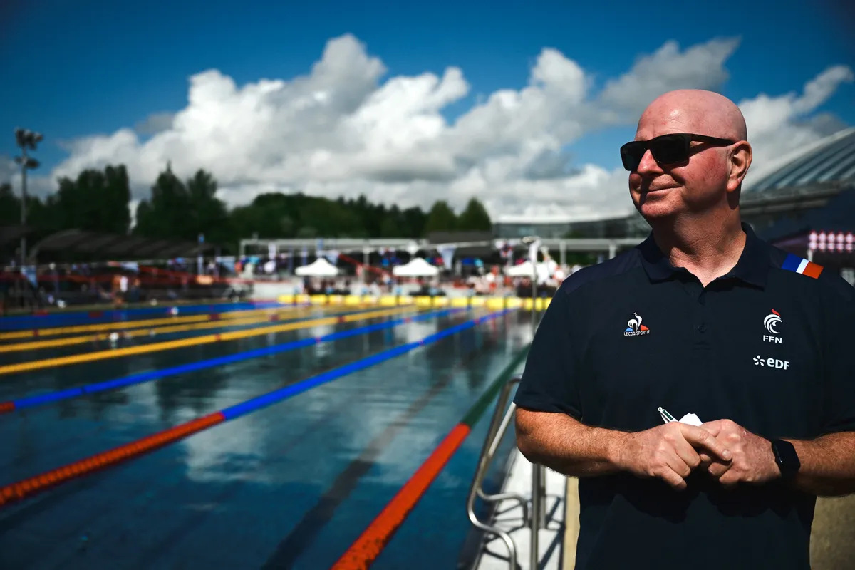 US' swimming coach Bob Bowman gives a press conference during a France swimming team's training session in the Aquatic Stadium's pool in Bellerive-sur-Allier near Vichy, on July 17, 2024, ahead of the Paris 2024 Olympic Games. (Photo by OLIVIER CHASSIGNOLE / AFP)