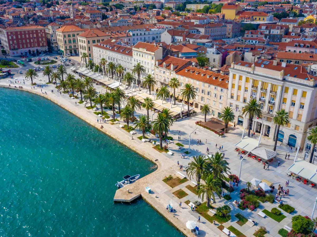 Aerial view of cityscape of Croatian city Split behind Riva promenade