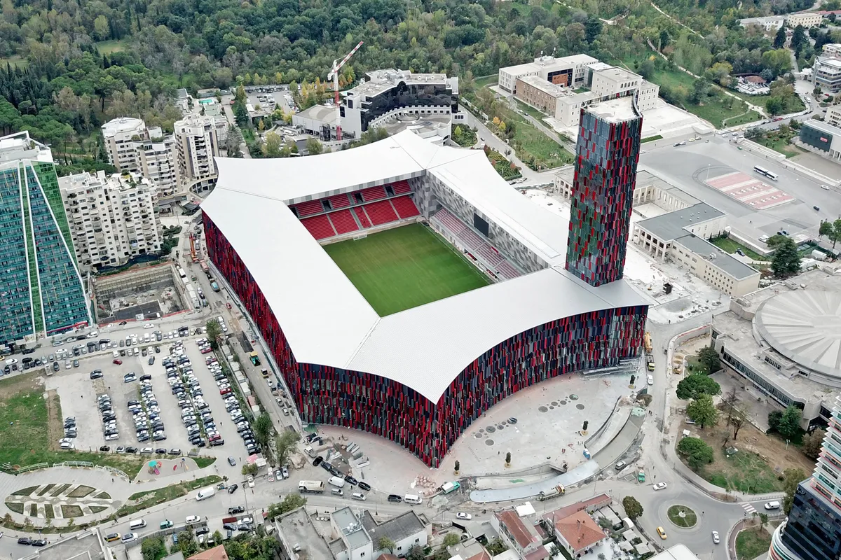 An aerial view taken on November 2, 2019, shows the new National Football Stadium of Tirana "Air Albania", which will host its first inaugural match on November 17, between Albania and France for the Euro 2020 Group H qualification football match. Albania is in a race against the clock to host the World Champions on November 17 at the new stadium in the heart of Tirana as part of the Euro 2020 qualifiers. But just a few days before the Albania-France match, the building is still under construction. Day and night, more than 200 people work hard to get everything finished on time. (Photo by Gent SHKULLAKU / AFP), kémbotrány