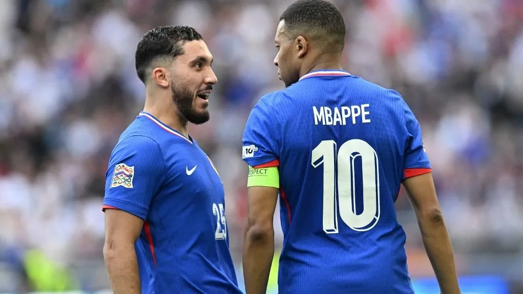Aranylabdát, France's forward #10 Kylian Mbappe (R) celebrates with France's forward #25 Rayan Cherki scoring the opening goal during the UEFA Nations League third place play-off football match between Germany and France in Stuttgart, southwestern Germany on June 8, 2025. (Photo by THOMAS KIENZLE / AFP)