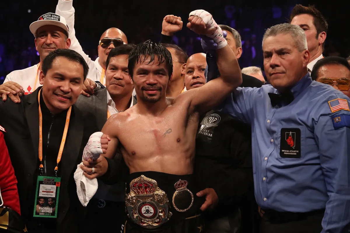 LAS VEGAS, NEVADA - JANUARY 19: Manny Pacquiao celebrates after defeating Adrien Broner by unanimous decision during the WBA welterweight championship at MGM Grand Garden Arena on January 19, 2019 in Las Vegas, Nevada. Christian Petersen/Getty Images/AFP (Photo by Christian Petersen / GETTY IMAGES NORTH AMERICA / Getty Images via AFP)