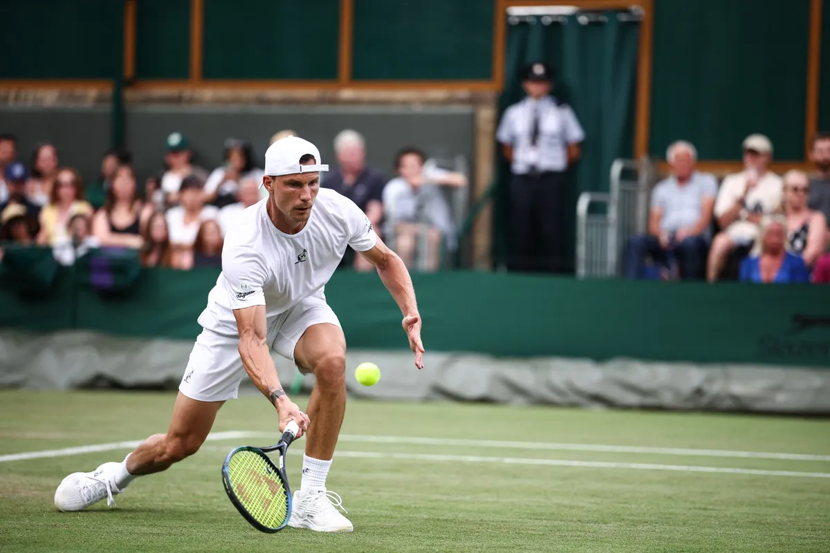 Fucsovics Márton, Hungary's Marton Fucsovics returns the ball to France's Gael Monfils during their men's singles second round tennis match on the fourth day of the 2025 Wimbledon Championships at The All England Lawn Tennis and Croquet Club in Wimbledon, southwest London, on July 3, 2025. (Photo by HENRY NICHOLLS / AFP) / RESTRICTED TO EDITORIAL USE
