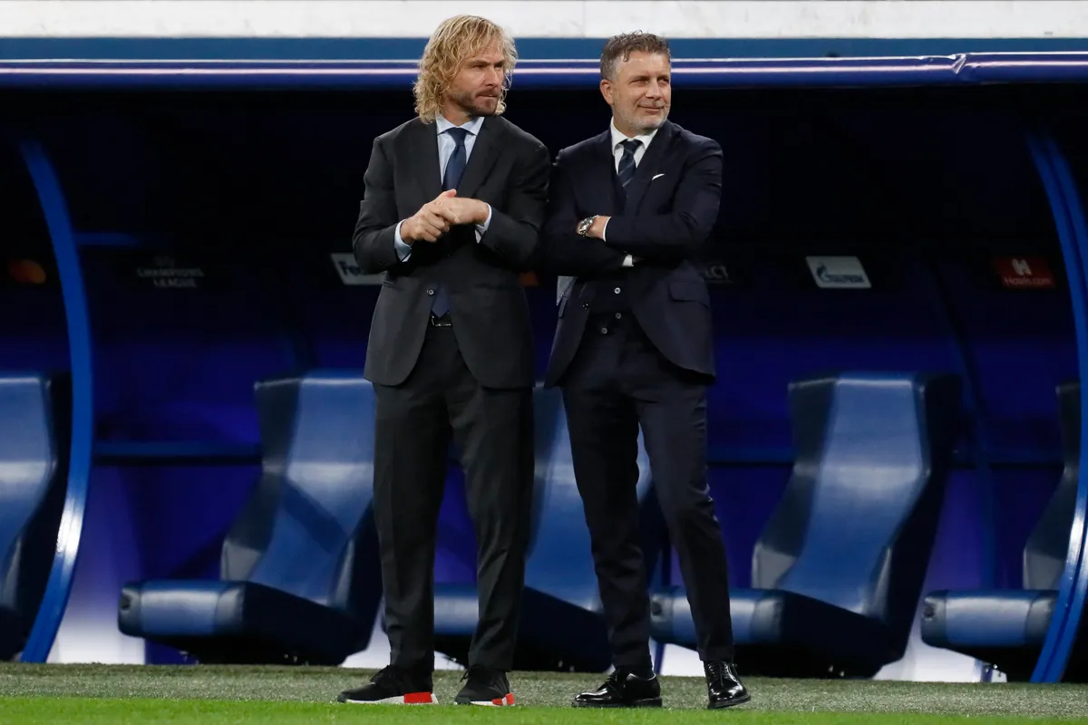 (L to R) Juventus Vice President Pavel Nedved and Football Director Federico Cherubini look on during warm-up ahead of the UEFA Champions League Group H football match between Zenit St. Petersburg and Juventus FC on October 20, 2021 at Gazprom Arena in Saint Petersburg, Russia. (Photo by Mike Kireev/NurPhoto) (Photo by Mike Kireev / NurPhoto via AFP)