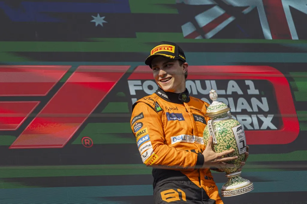 Oscar Piastri of Australia and McLaren F1 Team driver is holding the trophy after the race at the Formula 1 Hungarian Grand Prix in Mogyorod, Hungary, on July 21, 2024. (Photo by Robert Szaniszlo/NurPhoto) (Photo by Robert Szaniszlo / NurPhoto via AFP)