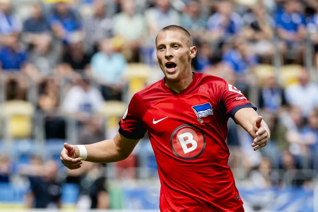 12 August 2023, Thuringia, Jena: Soccer: DFB Cup, 1st round, FC Carl Zeiss Jena - Hertha BSC at Ernst-Abbe-Sportfeld. Palkó Dárdai (Hertha BSC) celebrates after his 1:0 goal. Photo: Jacob Schröter/dpa - IMPORTANT NOTE: In accordance with the requirements of the DFL Deutsche Fußball Liga and the DFB Deutscher Fußball-Bund, it is prohibited to use or have used photographs taken in the stadium and/or of the match in the form of sequence pictures and/or video-like photo series. (Photo by Jacob Schröter / dpa Picture-Alliance via AFP)