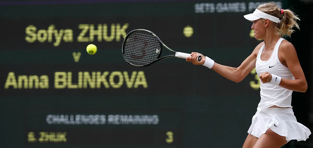 Russia's Sofya Zhuk returns against Russia's Anna Blinkova during the girls singles final on day twelve of the 2015 Wimbledon Championships at The All England Tennis Club in Wimbledon, southwest London, on July 11, 2015.   RESTRICTED TO EDITORIAL USE  --  AFP PHOTO / ADRIAN DENNIS (Photo by Adrian DENNIS / AFP), félmeztelen fotók