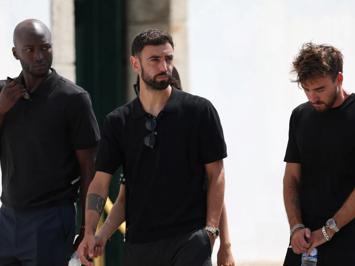 Diogo Jota, (From L) Portuguese football players Danilo Pereira, Bruno Fernandes and Andre Horta attend the funeral ceremony of Liverpool's Portuguese forward Diogo Jota and his brother Andre Silva at the Mother Church of Gondomar, on the outskirts of Porto, on July 5, 2025. Liverpool forward Diogo Jota and his brother died in a car crash in Spain on July 3, 2025, sparking widespread grief just after the Portugal star had got married. (Photo by FILIPE AMORIM / AFP) / The erroneous mention[s] appearing in the metadata of this photo by FILIPE AMORIM has been modified in AFP systems in the following manner: [Bruno Fernandes] instead of [Bruno Fendrich]. Please immediately remove the erroneous mention[s] from all your online services and delete it (them) from your servers. If you have been authorized by AFP to distribute it (them) to third parties, please ensure that the same actions are carried out by them. Failure to promptly comply with these instructions will entail liability on your part for any continued or post notification usage. Therefore we thank you very much for all your attention and prompt action. We are sorry for the inconvenience this notification may cause and remain at your disposal for any further information you may require.