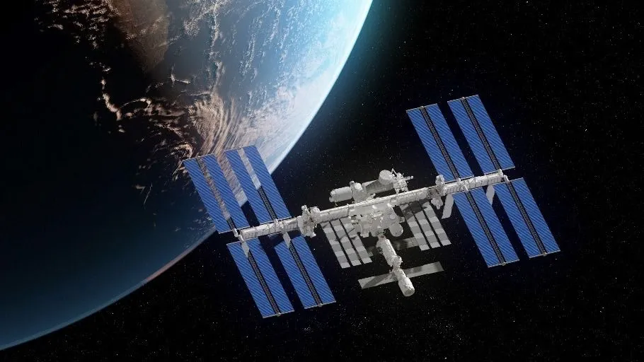 kísérlet ISS and Earth, computer illustration. (Photo by SEBASTIAN KAULITZKI/SCIENCE PHOT / SKX / Science Photo Library via AFP)