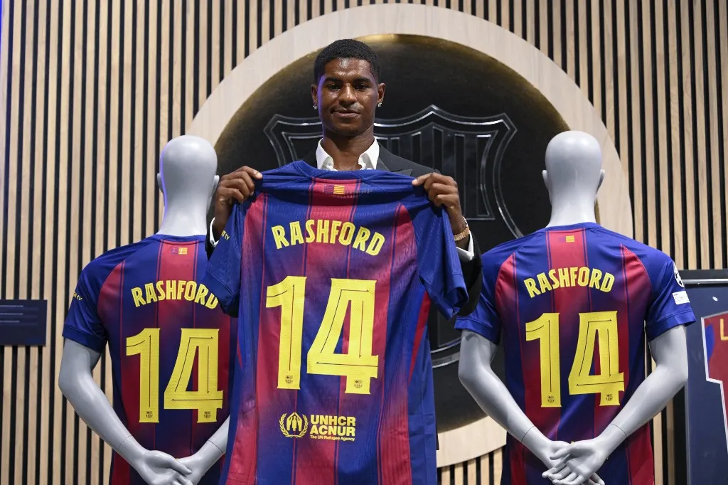 BARCELONA, SPAIN - JULY 23: English forward Marcus Rashford who joined Barcelona on loan from Manchester United holds up his new jersey during his official presentation at the Camp Nou stadium in Barcelona, Spain on July 23, 2025. Stringer / Anadolu (Photo by Anadolu via AFP)