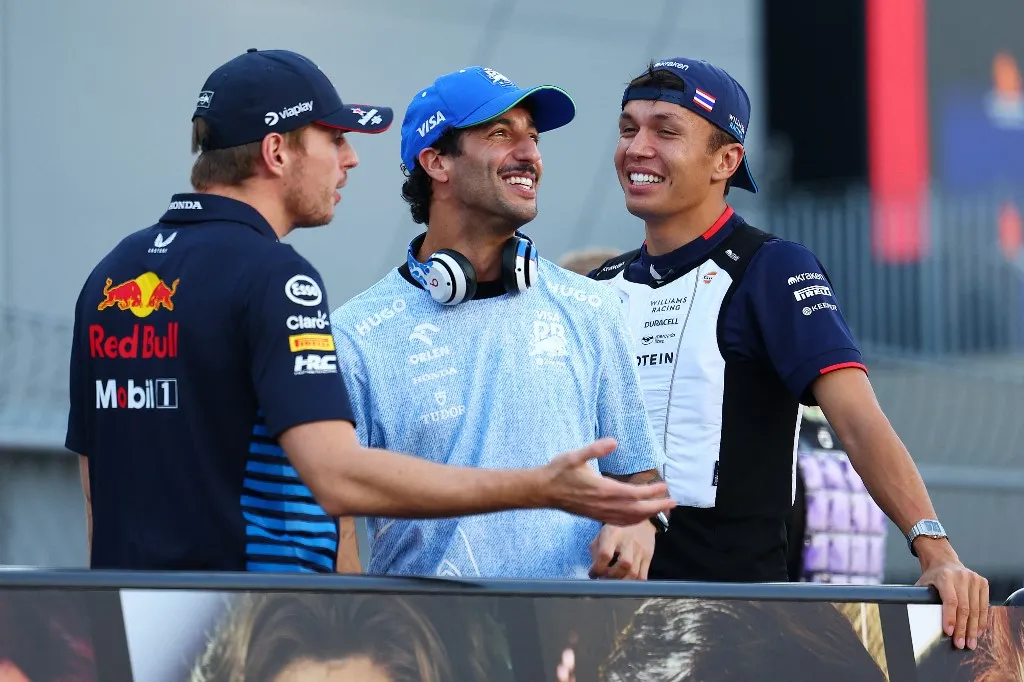 Daniel Ricciardo of Australia and Visa Cash App RB F1 Team reacts during the drivers' parade ahead of the F1 Grand Prix of Singapore at Marina Bay Street Circuit in Singapore, Singapore, on September 22, 2024. (Photo by Morgan Hancock/NurPhoto) (Photo by Morgan Hancock / NurPhoto via AFP)