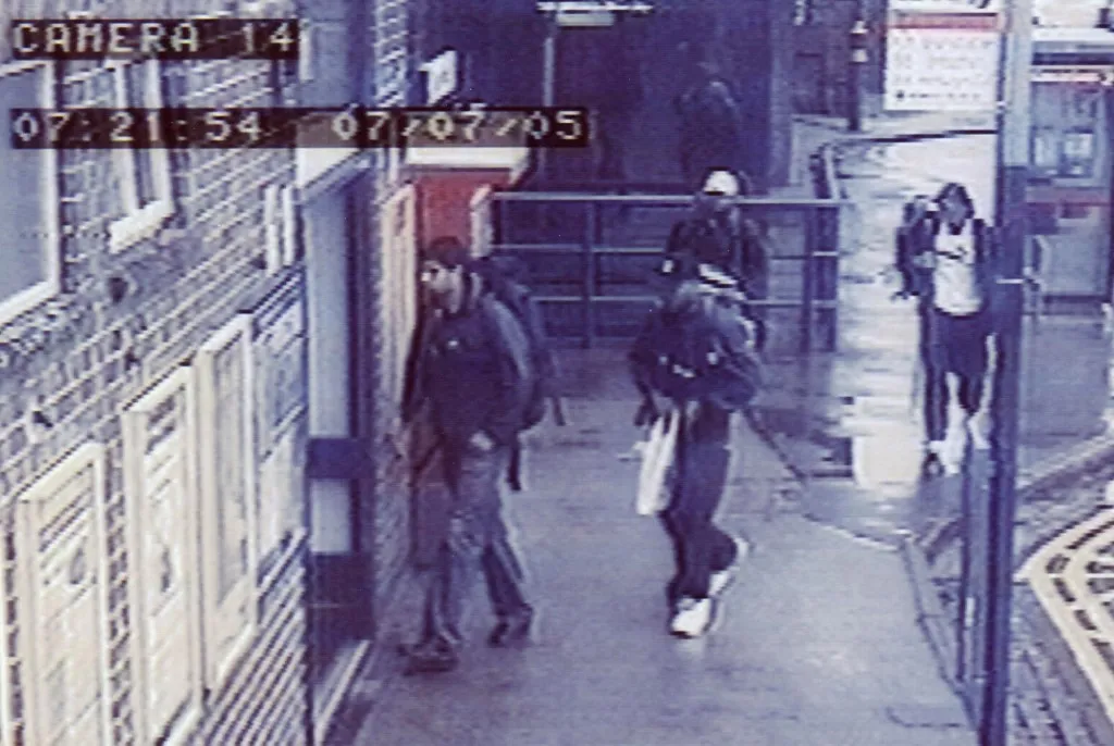 A British Metropolitan Police handout photo issued 16 July 2005 shows a CCTV image of (L-R:) Habib Hussain, Germaine Lindsay (dark cap), Mohammed Sidique Khan (light cap) and Shahzad Tanweer, the four suspected London suicide bombers, arriving at Luton train station at 07:21 on July 07. Two of the bombers behind last year's July 7 bombings in London "likely had some contact" with members of the Al-Qaeda terror network, an official report into the attacks said on Thursday. Mohammad Sidique Khan, 30, and Shehzad Tanweer, 22, were known to have travelled to Pakistan, the report said. "It has not yet been established who they met in Pakistan, but it is assessed as likely that they had some contact with Al-Qaeda figures," it said. AFP PHOTO/METROPOLITAN POLICE/HANDOUT (Photo by METROPOLITAN POLICE HANDOUT / HO / AFP)