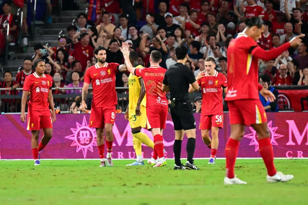 Szoboszlai Dominik (250726) -- HONG KONG, July 26, 2025 (Xinhua) -- Dominik Szoboszlai (2nd L) of Liverpool celebrates with teammates during the match between Liverpool and AC Milan of the Hong Kong Football Festival in Hong Kong, south China, July 26, 2025. (Xinhua/Zhu Wei) (Photo by Zhu Wei / Xinhua via AFP)
