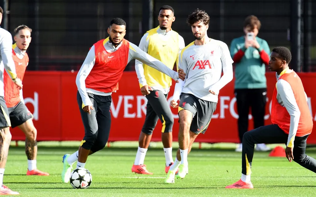 Liverpool's Dutch striker #18 Cody Gakpo and Liverpool's Hungarian midfielder #08 Dominik Szoboszlai take part in a training session, at the AXA training centre in Liverpool, north west England, on October 22, 2024, on the eve of their UEFA Champions League football match against RB Leipzig. (Photo by Peter POWELL / AFP)