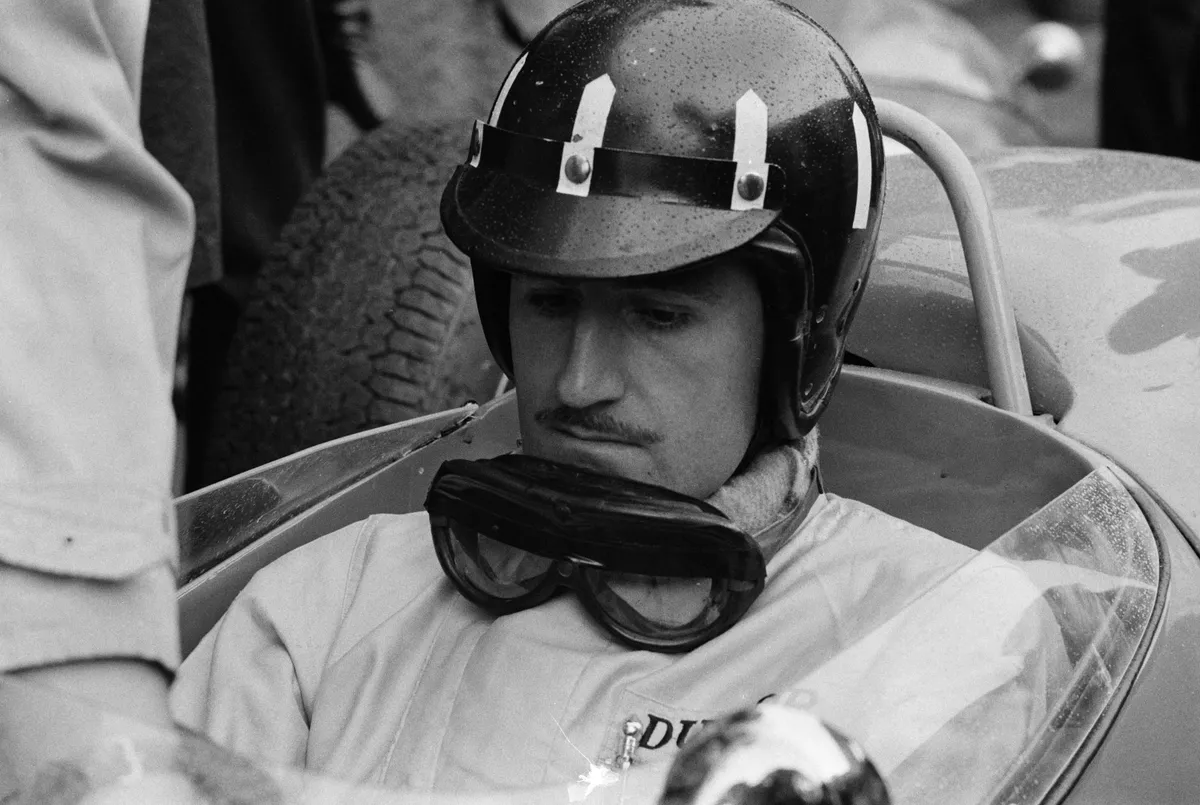 Graham Hill (Royaume-Uni) lors du Grand Prix automobile de Pau. 

Graham Hill (United Kingdom) during the Motor-racing Grand Prix of Pau. (Photo by Jean Claude Mallinjod / Ina via AFP)