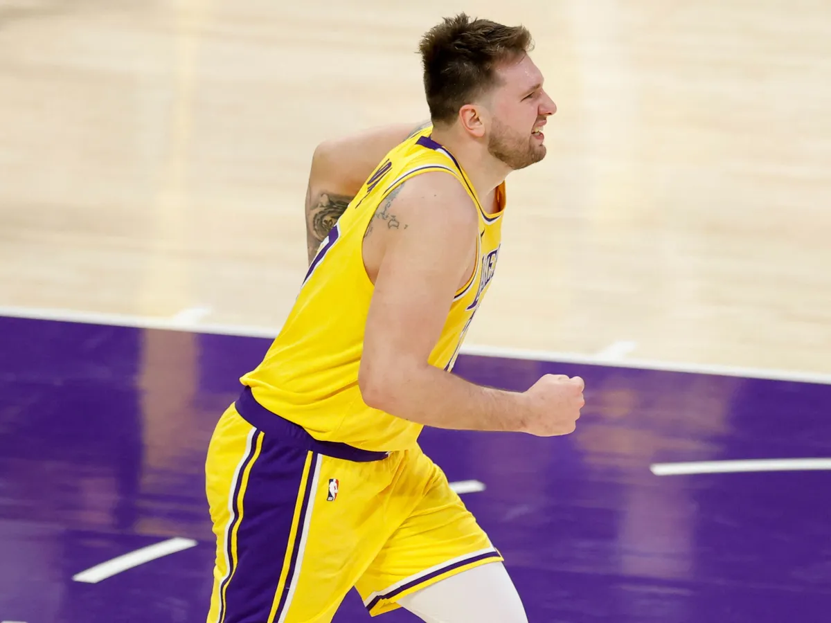 LOS ANGELES, CALIFORNIA - APRIL 30: Luka Doncic #77 of the Los Angeles Lakers reacts during the third quarter in Game Five of the Western Conference First Round NBA Playoffs \Mat Crypto.com Arena on April 30, 2025 in Los Angeles, California. NOTE TO USER: User expressly acknowledges and agrees that, by downloading and or using this photograph, User is consenting to the terms and conditions of the Getty Images License Agreement.   Harry How/Getty Images/AFP (Photo by Harry How / GETTY IMAGES NORTH AMERICA / Getty Images via AFP)