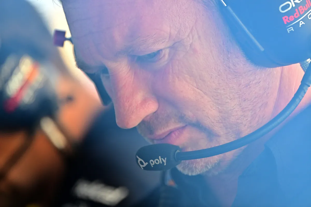 (FILES) Red Bull Racing's team principal Christian Horner is seen through a window in the pits prior to the qualifying session at the Hungaroring race track in Mogyorod near Budapest on July 22, 2023, ahead of the Formula One Hungarian Grand Prix. Christian Horner is to leave his role as Red Bull team principal with immediate effect after 20 years, the Formula One team announced on July 9, 2025. (Photo by MARTON MONUS / POOL / AFP)