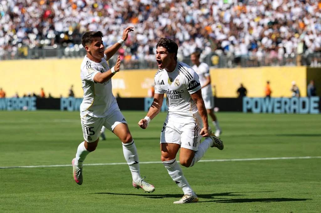 EAST RUTHERFORD, NEW JERSEY - JULY 05: Fran Garcia #20 of Real Madrid C. F. celebrates scoring his team's second goal during the FIFA Club World Cup 2025 quarter-final match between Real Madrid CF and Borussia Dortmund at MetLife Stadium on July 05, 2025 in East Rutherford, New Jersey.   Francois Nel/Getty Images/AFP (Photo by Francois Nel / GETTY IMAGES NORTH AMERICA / Getty Images via AFP)