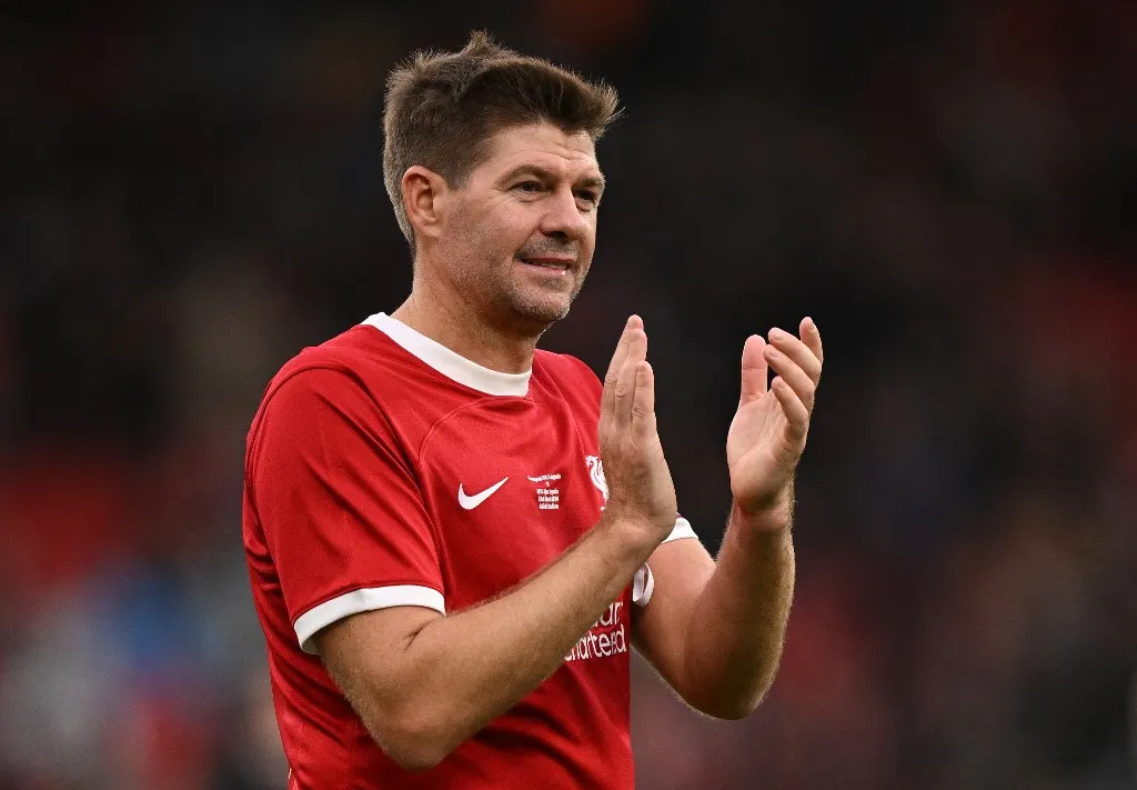 Liverpool Legends' midfielder Steven Gerrard applauds the fans following during the Legends football match between Liverpool Legends and Ajax Legends at Anfield in Liverpool, north-west England on March 23, 2024. (Photo by Oli SCARFF / AFP)