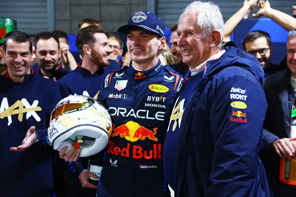 LAS VEGAS, NEVADA - NOVEMBER 23: 2024 F1 World Drivers Champion Max Verstappen of the Netherlands and Oracle Red Bull Racing celebrates with Oracle Red Bull Racing Team Consultant Dr Helmut Marko in the Paddock after the F1 Grand Prix of Las Vegas at Las Vegas Strip Circuit on November 23, 2024 in Las Vegas, Nevada.   Mark Thompson/Getty Images/AFP (Photo by Mark Thompson / GETTY IMAGES NORTH AMERICA / Getty Images via AFP)