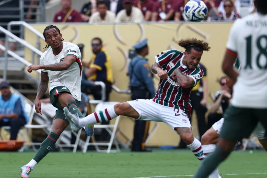 Chelsea's Brazilian forward #20 Joao Pedro (R) scores the opening goal during the FIFA Club World Cup 2025 semifinal football match between Brazil's Fluminense and England's Chelsea at the MetLife stadium in East Rutherford, New Jersey on July 8, 2025. (Photo by FRANCK FIFE / AFP)