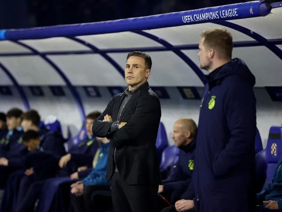 Dinamo Zagreb's Italian coach Fabio Cannavaro (C) looks on ahead of the UEFA Champions League, league phase - day 8 football match between GNK Dinamo Zagreb and AC Milan at Maksimir Stadium in Zagreb on January 29, 2025. (Photo by Damir SENCAR / AFP)
