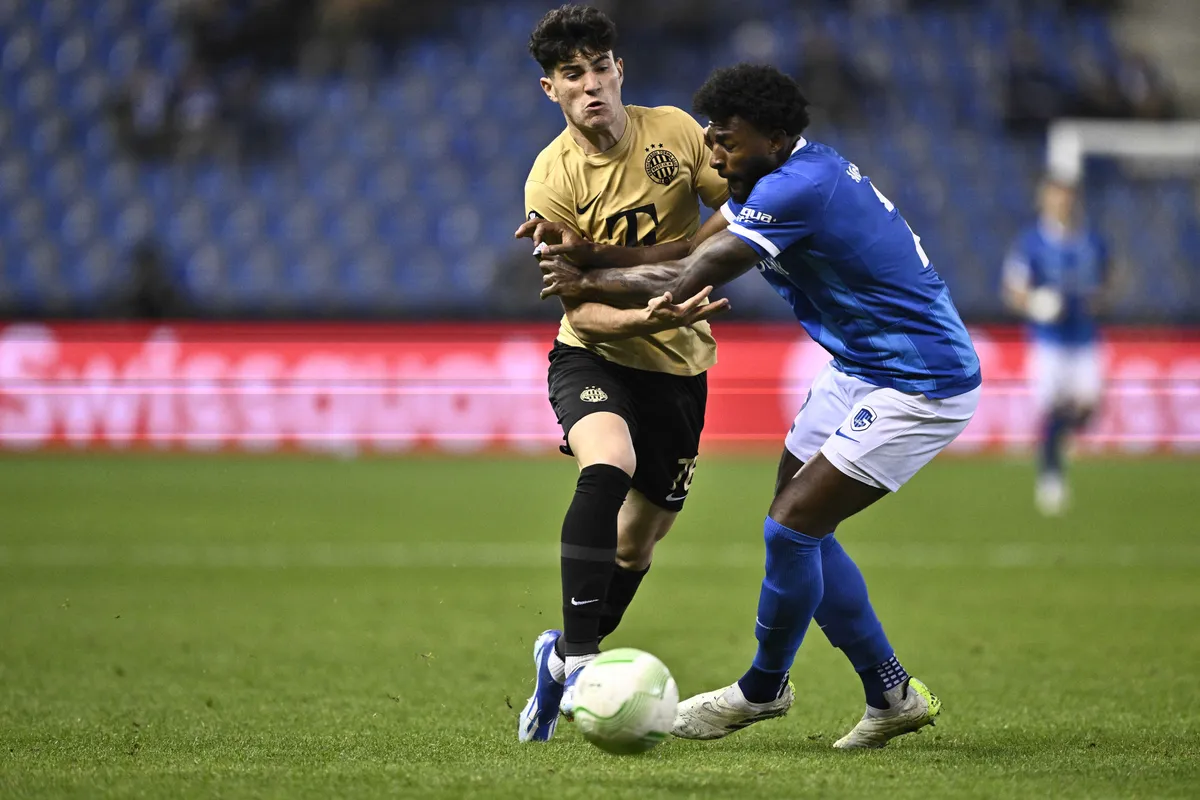 Ferencvaros' Krisztian Lisztes and Genk's Alexander McKenzie fight for the ball during a game between Belgian soccer team KRC Genk and Hungarian Ferencvaros, on Thursday 26 October 2023 in Genk, on day 3 of the group phase of the UEFA Conference League competition, in group F. BELGA PHOTO JOHAN EYCKENS (Photo by JOHAN EYCKENS / BELGA MAG / Belga via AFP)