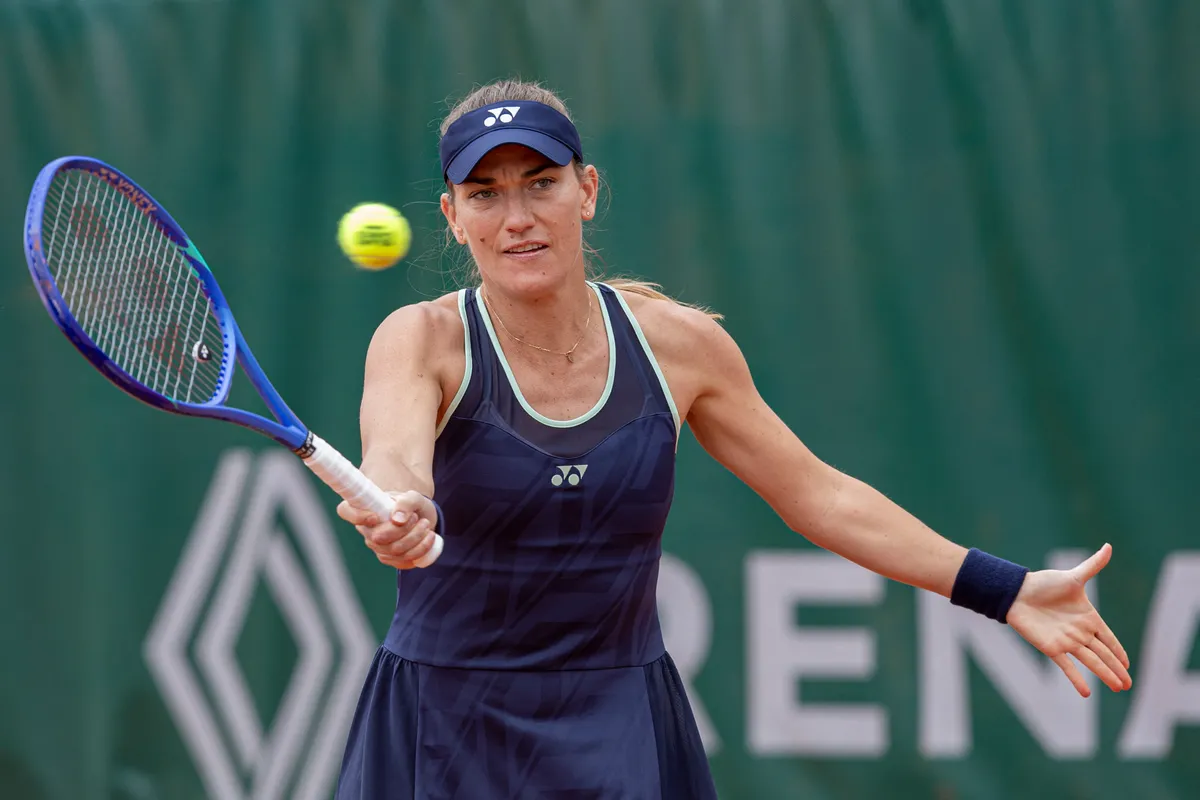 Timea Babos returns the ball against Anhelina Kalinina and Yifan Xu at the Roland Garros Grand Slam Tournament in Paris, France, on May 28, 2025. (Photo by Robert Szaniszlo/NurPhoto) (Photo by Robert Szaniszlo / NurPhoto via AFP)
