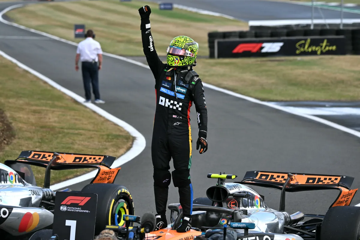 McLaren's British driver Lando Norris celebrates winning the Formula One British Grand Prix at the Silverstone motor racing circuit in Silverstone, central England, on July 6, 2025. (Photo by Andrej ISAKOVIC / AFP)