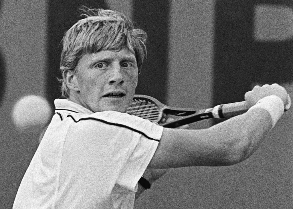 German Boris Becker hits a return to Spaniard Emilio Sanchez during their match for the French Tennis Open tournament at the Roland Garros stadium on June 2, 1986. Becker won the match within five sets. (Photo by AFP)