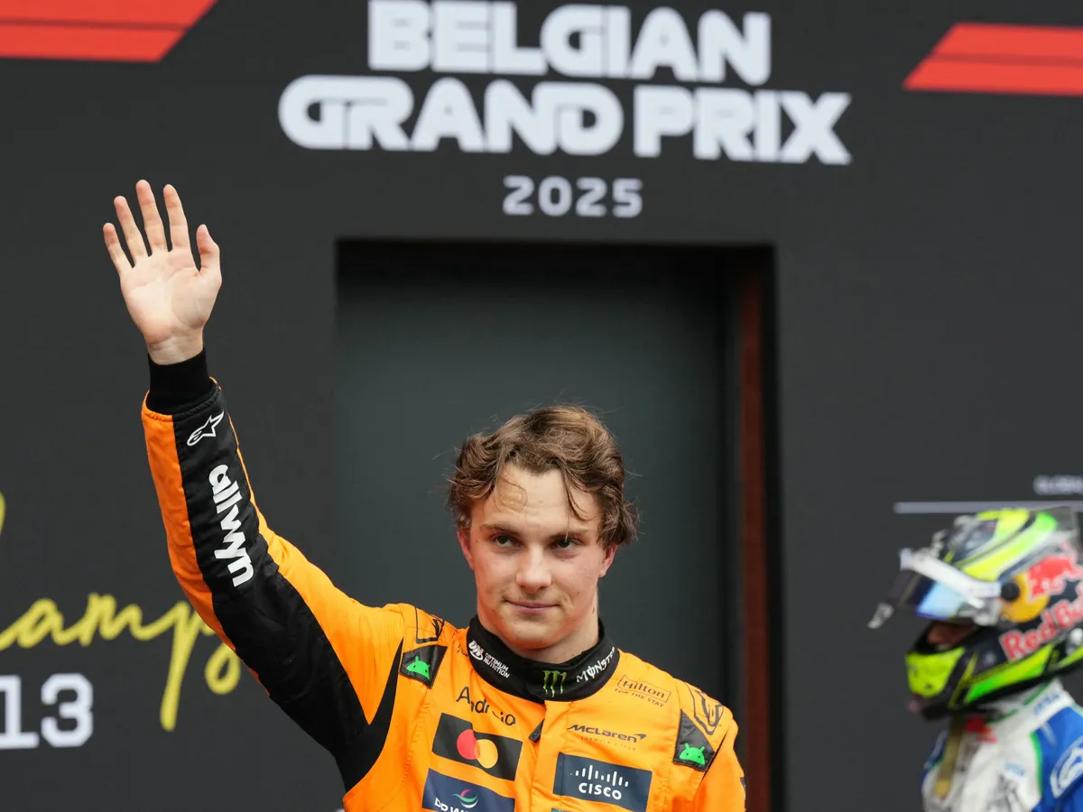 Australian driver Oscar Piastri celebrates after winning the Formula One Belgian Grand Prix at the Spa-Francorchamps circuit in Spa, on July 27, 2025. (Photo by Dimitar DILKOFF / AFP)
