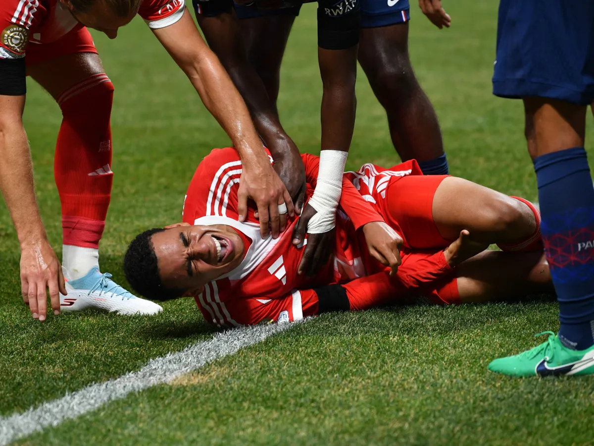 ATLANTA, USA - JULY 5: Jamal Musiala of Bayern Munich gets injured during 2025 FIFA Club World Cup quarter-final football match between Paris Saint-Germain and Bayern Munich at Mercedes Benz Stadium in Atlanta, GA, United States on July 5, 2025. Peter Zay / Anadolu (Photo by Peter Zay / Anadolu via AFP)