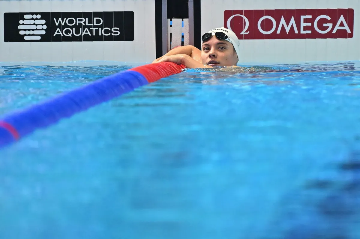 Szingapúr, 2025. július 28.
Fángli Henrietta a célban a női 100 méteres mellúszás selejtezőjében a szingapúri vizes világbajnokságon a World Aquatics Arénában 2025. július 28-án.
MTI/Illyés Tibor