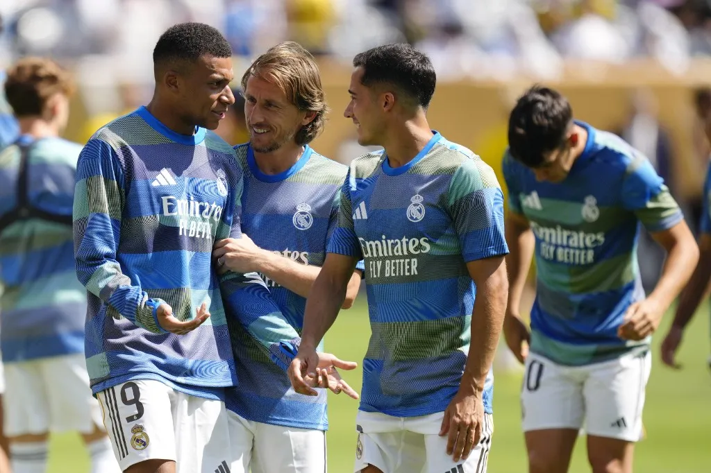 Kylian Mbappe centre-forward of Real Madrid and France and Luka Modric central midfield of Real Madrid and Croatia during the warm-up before the FIFA Club World Cup 2025 quarter final match between Real Madrid CF and Borussia Dortmund at MetLife Stadium on July 5, 2025 in East Rutherford, United States.  (Photo by Jose Breton/Pics Action/NurPhoto) (Photo by Jose Breton / NurPhoto via AFP)