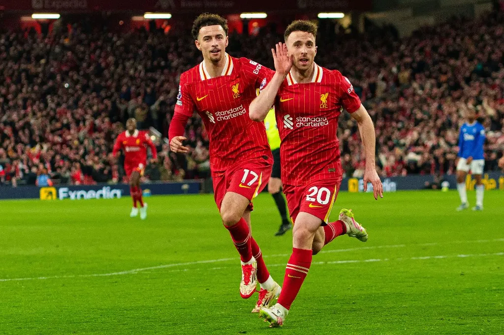 Liverpool's Diogo Jota celebrates after scoring their first goal during the Premier League match between Liverpool and Everton at Anfield in Liverpool, England, on April 2, 2025. (Photo by Steven Halliwell | MI News/NurPhoto) (Photo by MI News / NurPhoto via AFP)