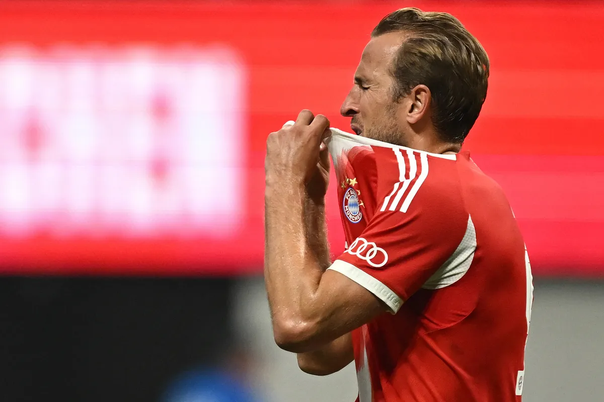 Bayern Munich's English forward #09 Harry Kane reacts after losing the FIFA Club World Cup 2025 quarterfinal football match between France's Paris Saint-Germain and Germany's Bayern Munich at the Mercedes-Benz Stadium in Atlanta on July 5, 2025. (Photo by Paul ELLIS / AFP)