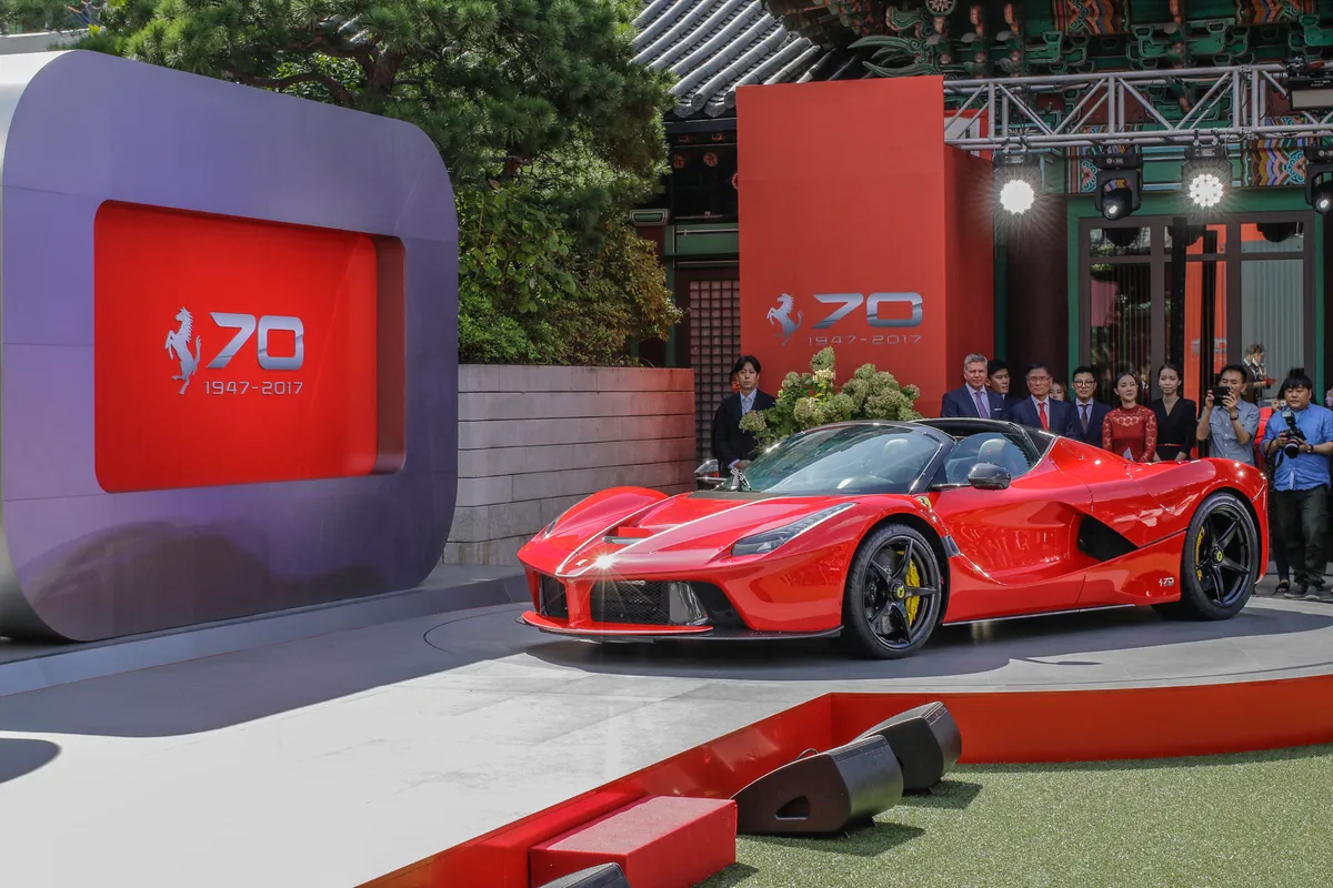 View of La Ferrari aperta displayed event room during an Ferrari 70th Anniversary event in Seoul's Hotel, South Korea. The biggest Ferrari auction took place last Saturday and, just like wed called it, history was made. On September 9, RM Sothebys auctioned off a LaFerrari Aperta for a staggering $10 million (8.3 million to be exact). Coinciding with Ferraris 70th anniversary, the sale sets a new record for the most expensive modern car to sell at auction ? a record previously held by another Ferrari car. (Photo by Seung-il Ryu/NurPhoto) (Photo by Seung-il Ryu / NurPhoto via AFP)
