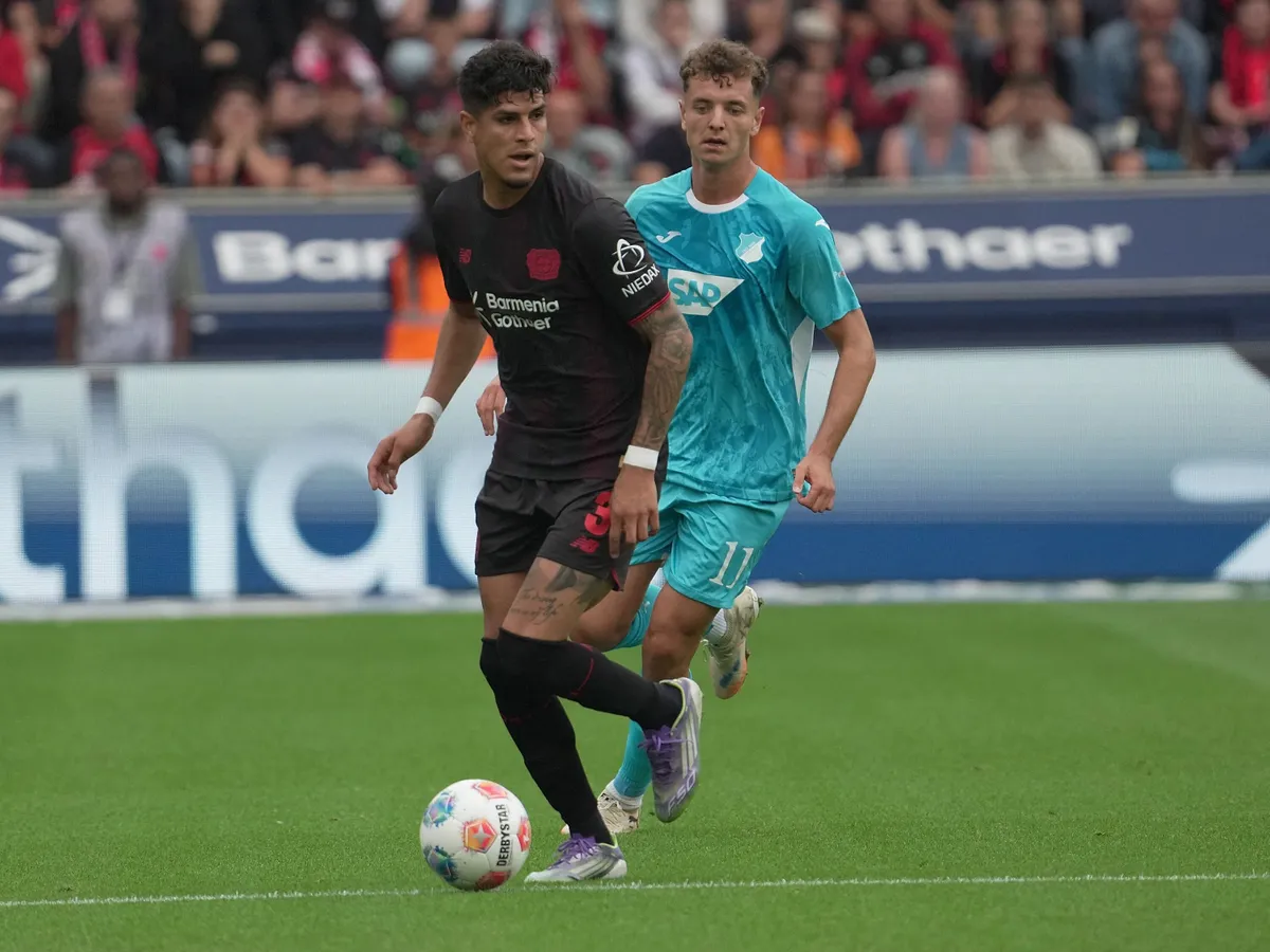 08/23/2025, BayArena, Leverkusen, GER, 1.FBL, Bayer Leverkusen vs TSG Hoffenheim, in the picture Piero Hincapie (Leverkusen) DFL regulations prohibit any use of photographs as image sequences and/or quasi-video. (Photo by Hasan Bratic / dpa Picture-Alliance via AFP)