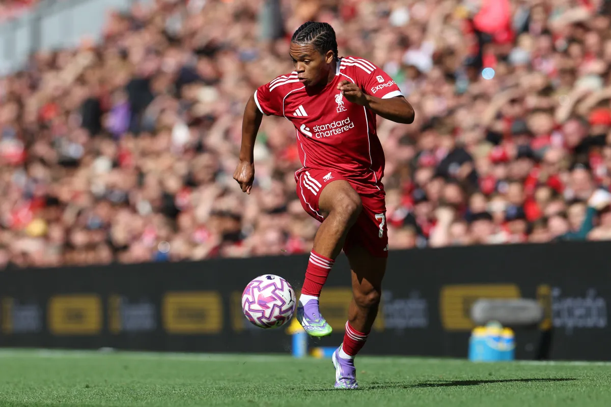 Liverpool's English striker #73 Rio Ngumoha controls the ball during the first of two pre season friendly football matches between Liverpool and Athletic Bilbao at Anfield in Liverpool, north west England on August 4, 2025. (Photo by Darren Staples / AFP)